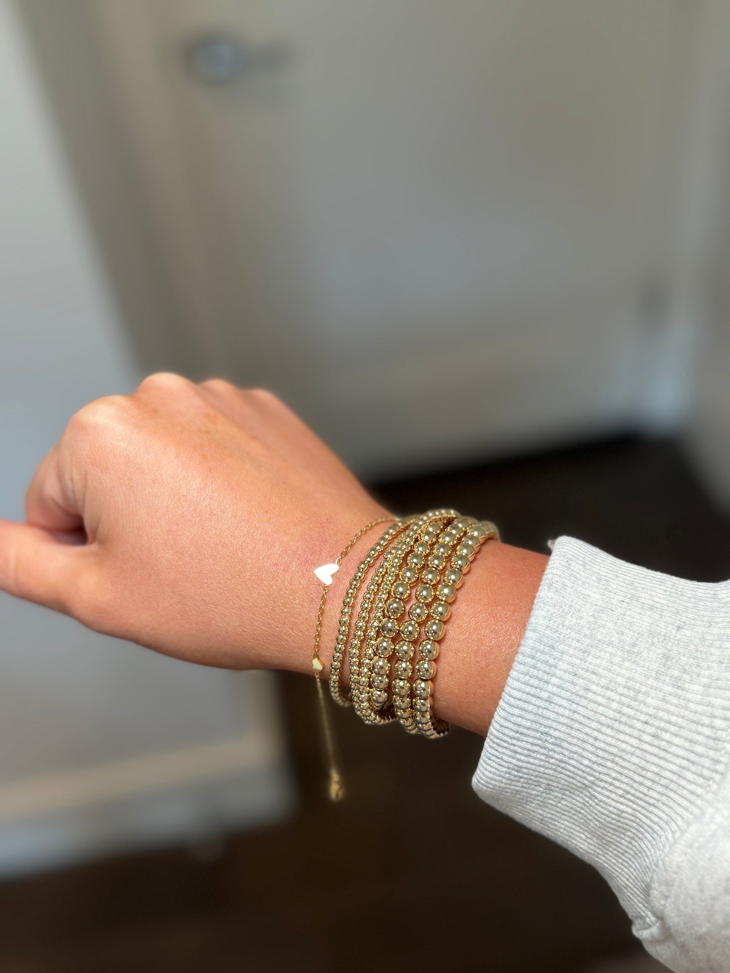 Triple Heart Bracelet in Gold